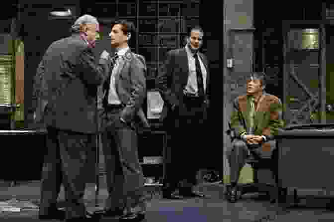 A Group Of Actors Performing A Scene From A David Mamet Play, With Intense Expressions And Body Language. Theatre David Mamet