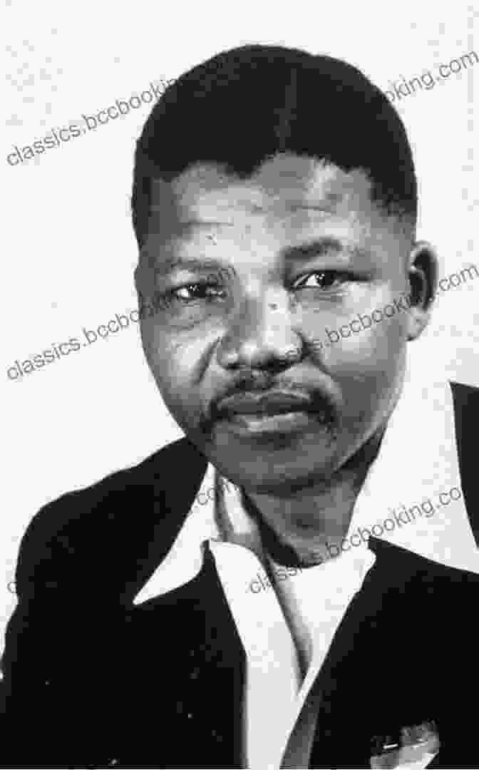 A Young Nelson Mandela Stares Defiantly Into The Camera, His Eyes Full Of Determination And Resolve. Young Mandela: The Revolutionary Years